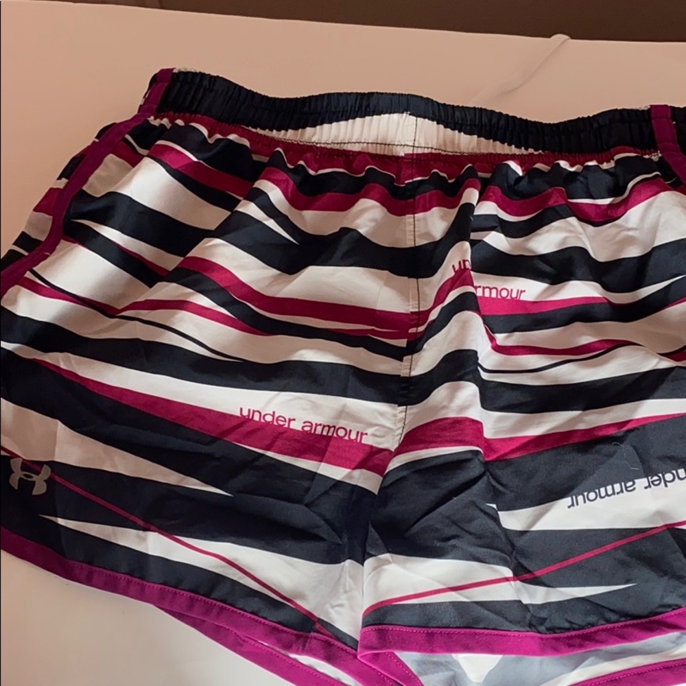 Under ARMER heat Gear. Black pink and white color